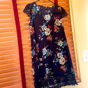 Floral printed, navy blue dress. Worn once. Great condition.